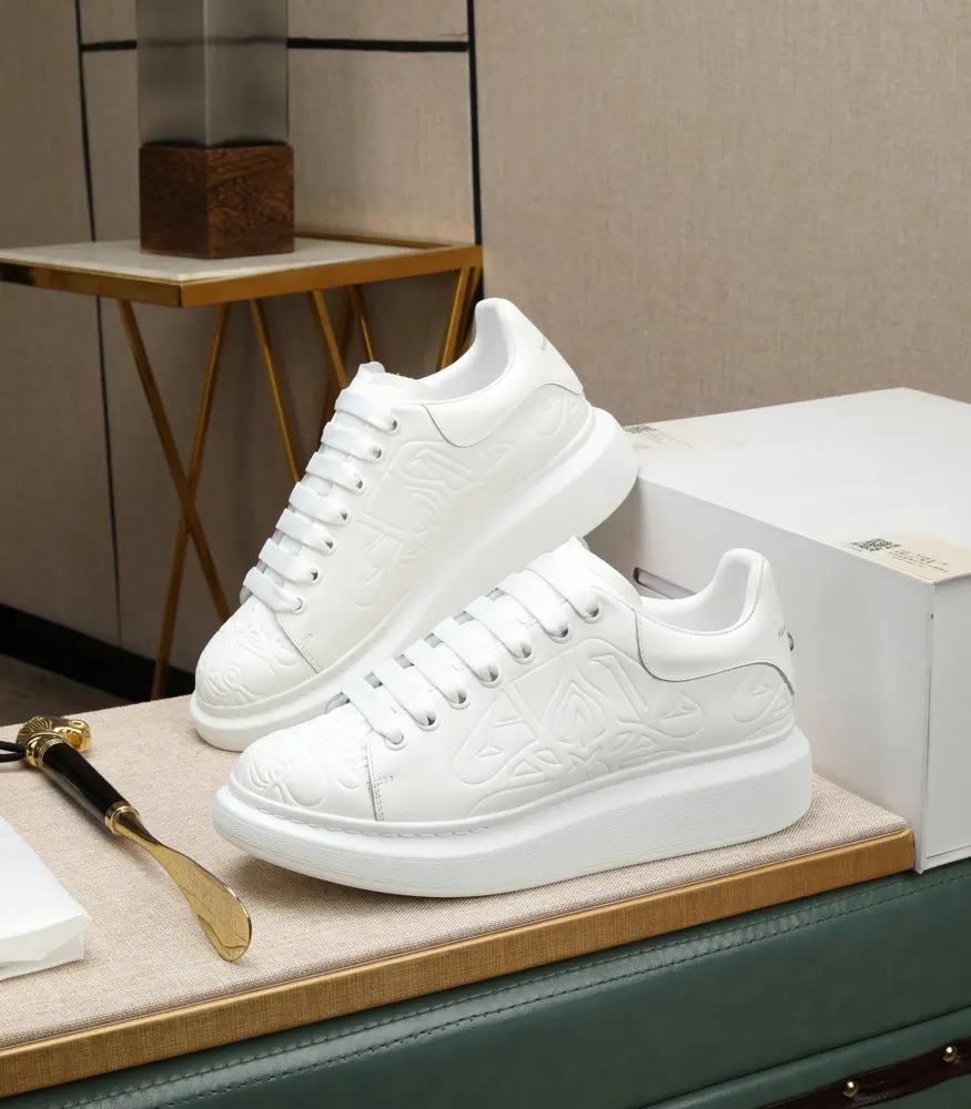 McQueen couple’s white shoes