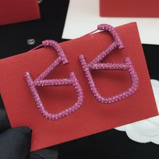 Valentino Large V-shaped earrings with full diamonds