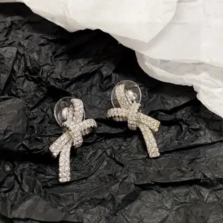 Chanel diamond bow earrings