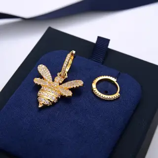 Apm monaco asymmetrical bee stud earrings