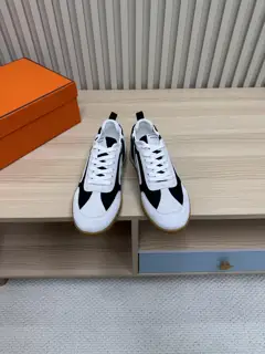 Hermès casual sneakers Suede goatskin sneakers decorated with contrasting patterns and