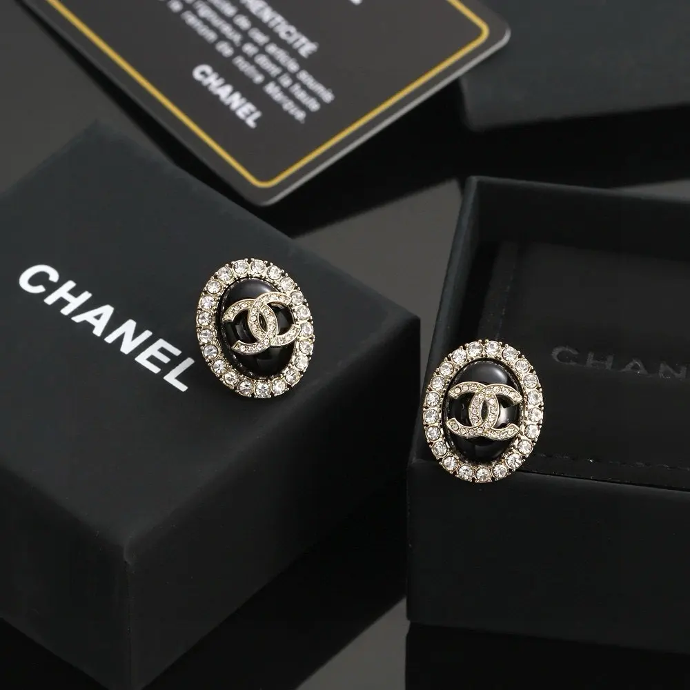 Chanel black pearl round earrings