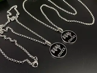 Gucci black enamel double G round pendant necklace