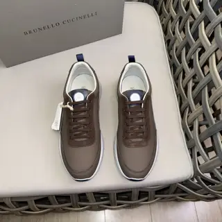 Brunello Cucinelli color-blocked sports flats for men. This pair of flat sports shoes