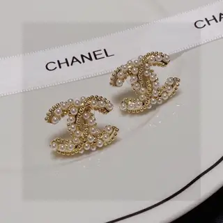 Chanel bow pearl earrings