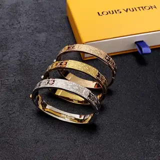 Louis Vuitton unisex bracelet with engraved letters and diamonds on both sides