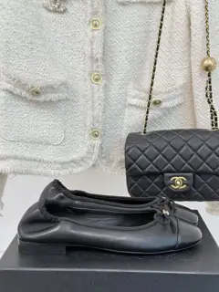 Chanel’s timeless classic color-blocked bow ballet shoes
