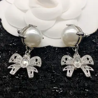 miumiu bow pearl earrings