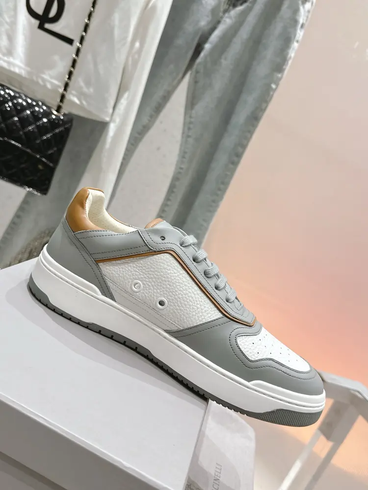 Brunello Cucinelli color-blocked sports flats for men. This pair of flat sports shoes