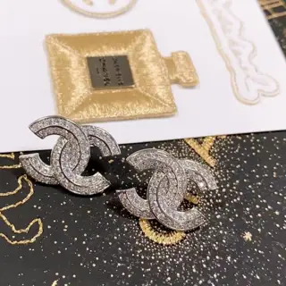 Chanel double row letter crystal earrings