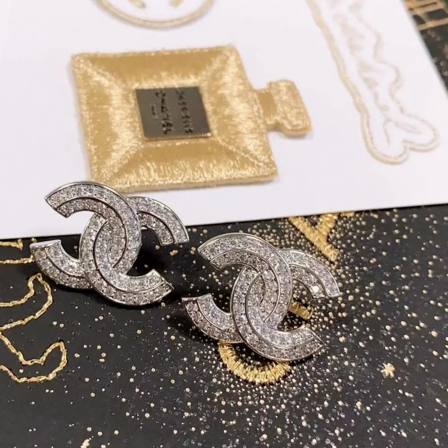 Chanel double row letter crystal earrings
