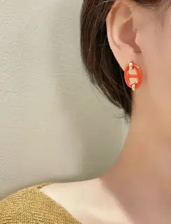 Hermès Mini Maillon orange earrings