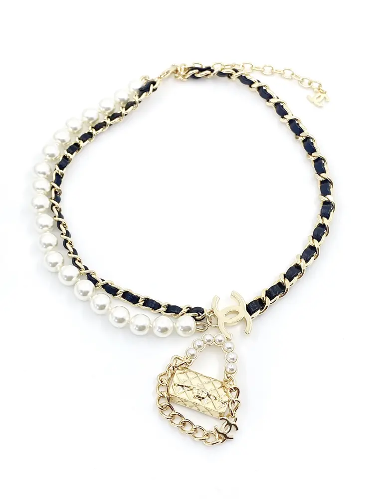 Chanel black leather pearl necklace