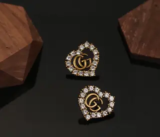 Gucci counter synchronization Heart peach colored diamond earrings. Choose a few favorite