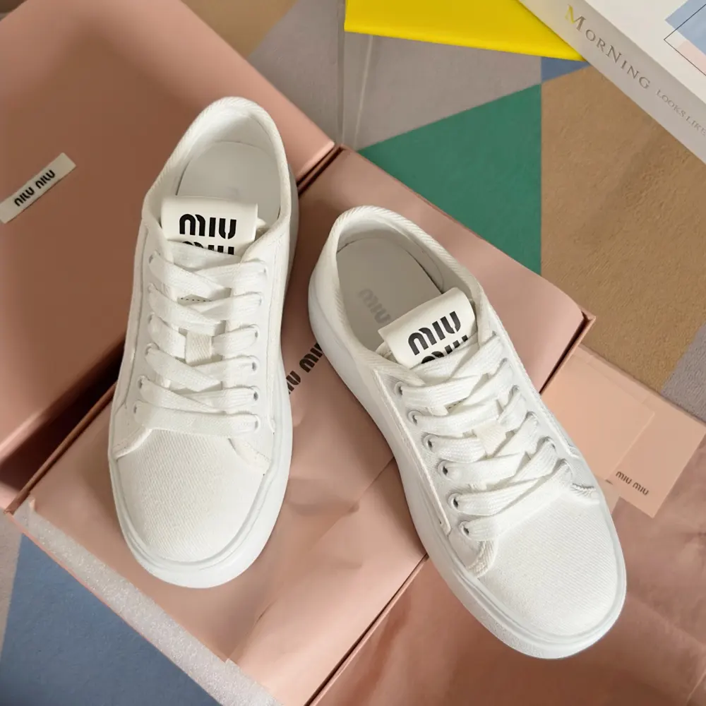 Miu Miu Miu latest model canvas thick sole biscuit shoes denim casual sports shoes