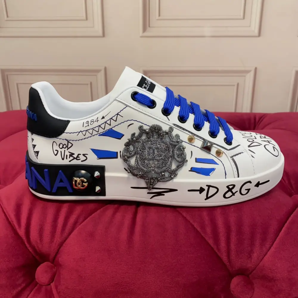 Dolce & Gabbana casual sneakers are exclusively made to order. The brand lettering is