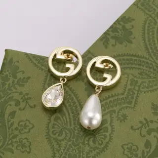 Gucci asymmetrical earrings