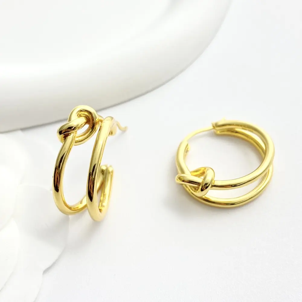 Celine gold twist earrings