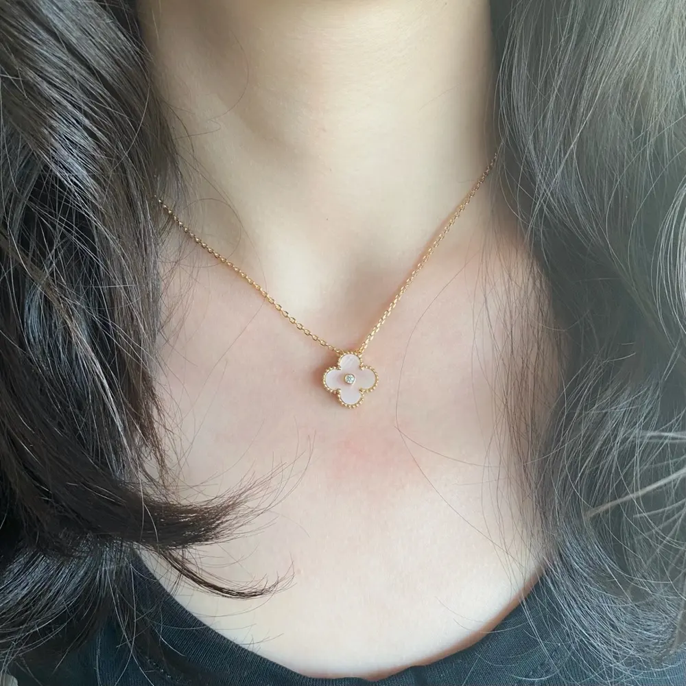 Van Cleef & Arpels natural pink shell with diamond-backed four-leaf clover necklace