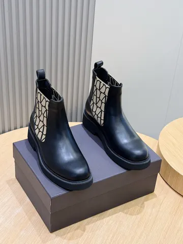 Valentino Men’s V Logo Leather and Naked Boots