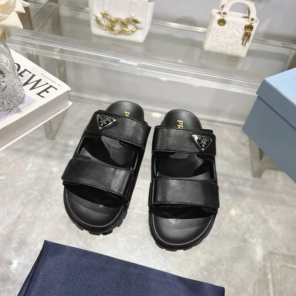 Prada’s latest Prada slippers are 90s-style slipper-style sandals that exude a feminine