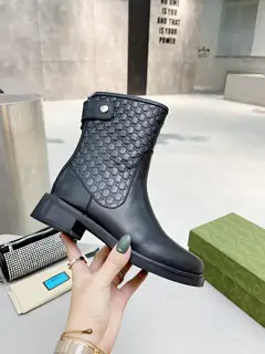 Gucci ankle boots with small embossed pattern