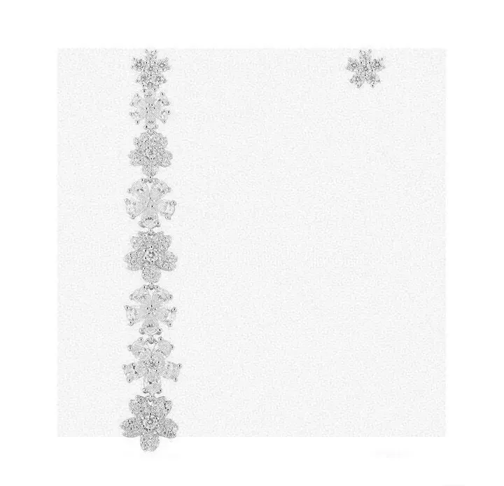 Apm monaco asymmetrical silver-white flower earrings