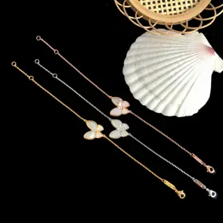 Van Cleef & Arpels four-piece curved white mother-of-pearl horse-eye diamond butterfly