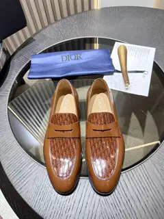 The Dior Granville loafer is a modern take on the dress shoe. Crafted in beige and black