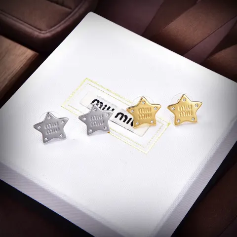 Miumiu’s latest five-pointed star earrings from the Paris show