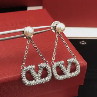 Valentino earrings with tassels and diamonds