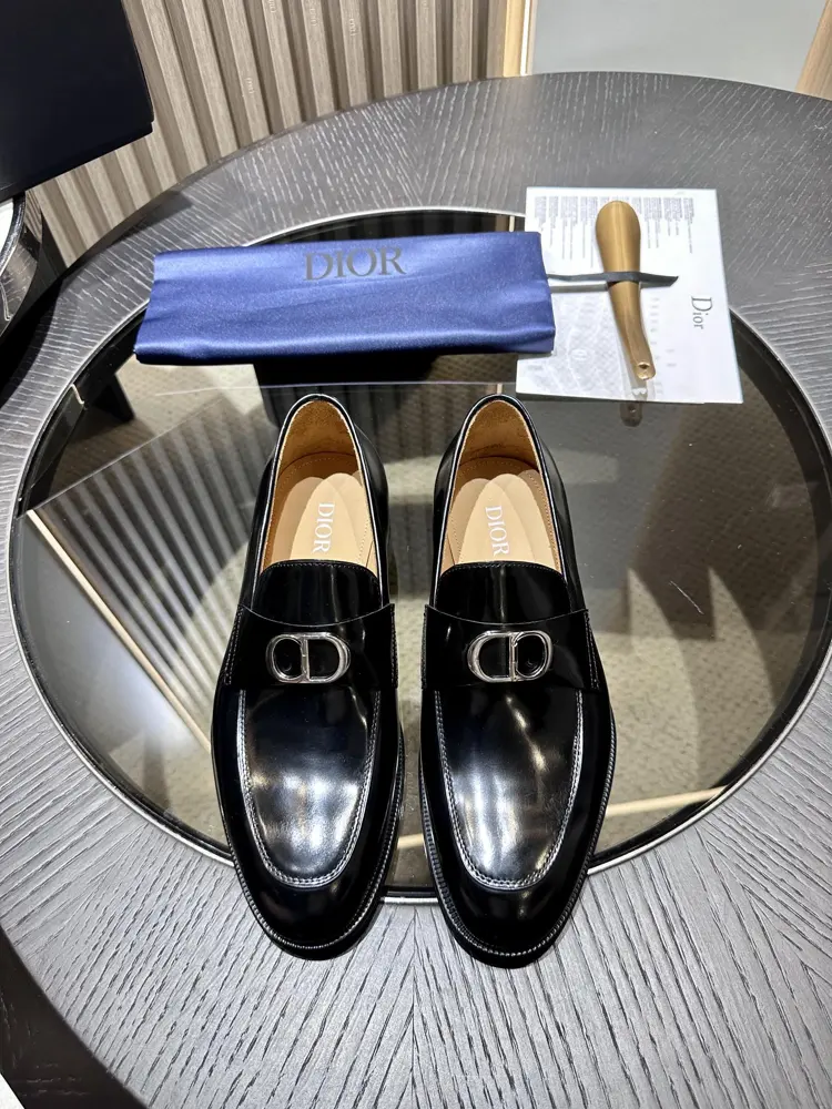 The Dior Granville loafer is a modern take on the dress shoe. Crafted in beige and black