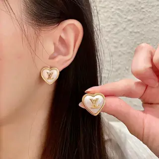 Louis Vuitton vintage letter earrings