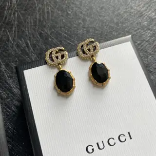 Gucci stud earrings Original logo print