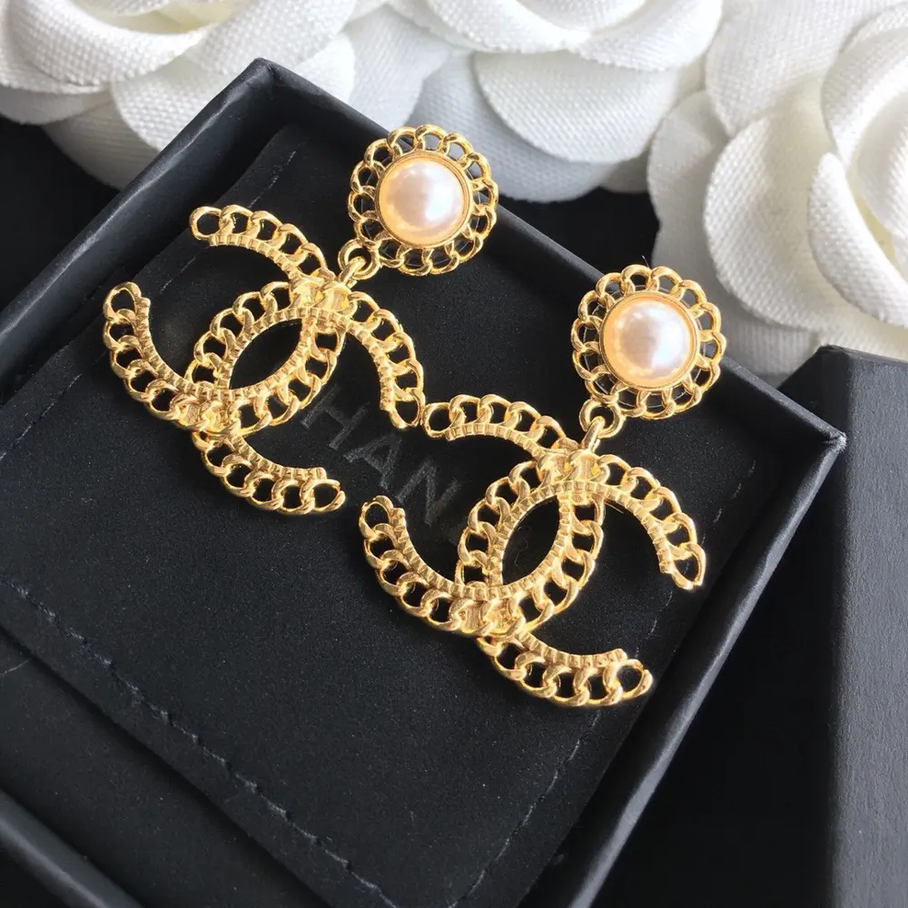 Chanel pearl letter button string earrings