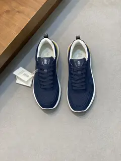 Brunello Cucinelli color-blocked sports flats for men. This pair of flat sports shoes