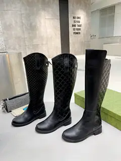 Gucci long boots with large embossed pattern
