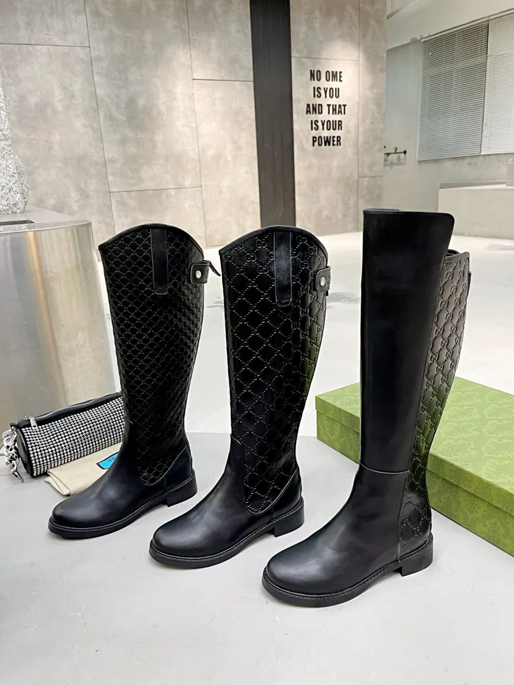 Gucci long boots with large embossed pattern