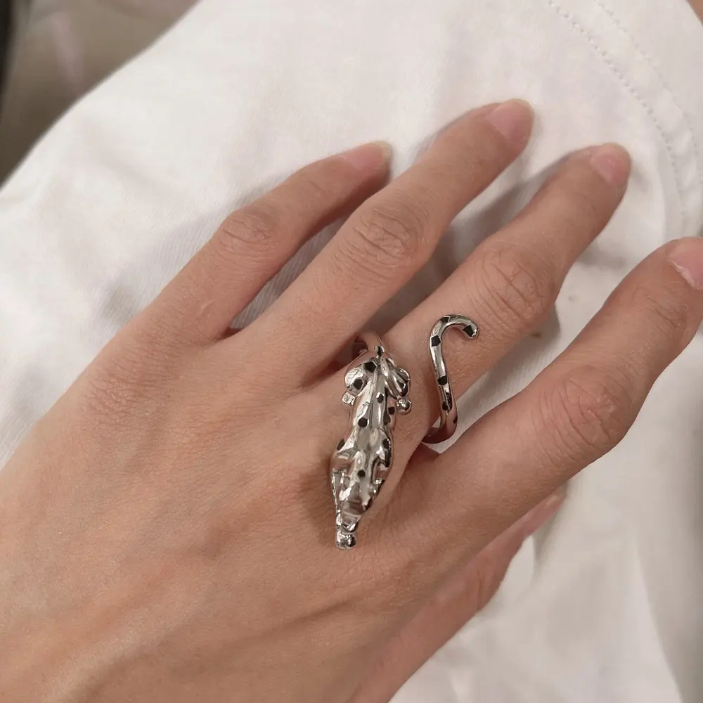 Cartier’s domineering spotted three-dimensional black panther polished ring Panthère de