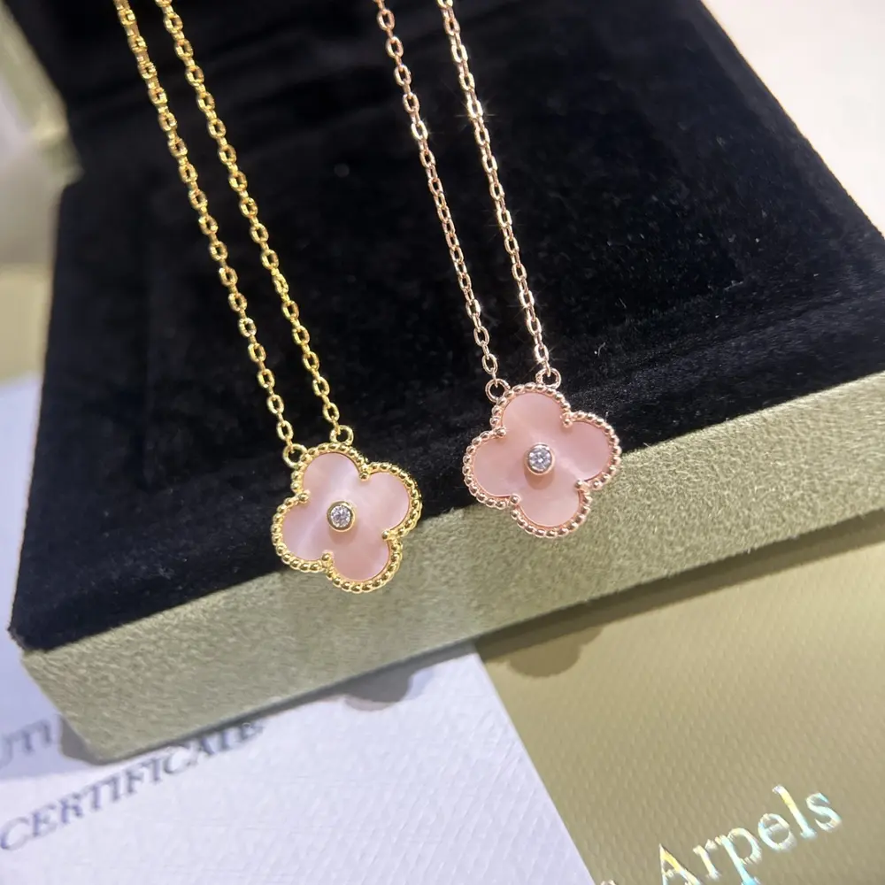 Van Cleef & Arpels natural pink mother-of-pearl with diamonds four-leaf clover necklace