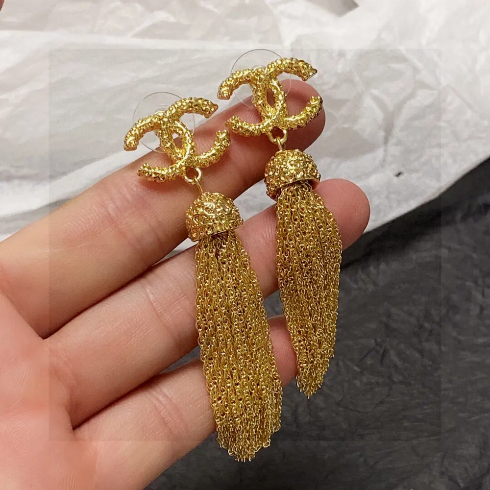 Chanel Double C long antique gold tassel earrings