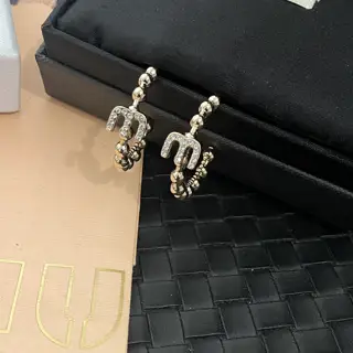 miumiu round crystal diamond letter earrings