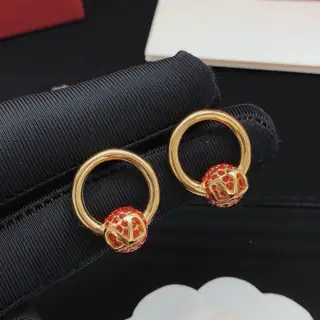 Valentino round earrings with diamonds in red