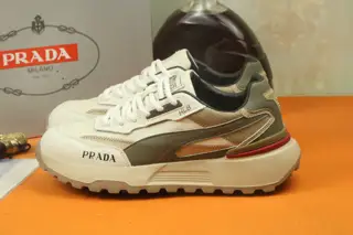 Prada Italian men’s shoes are featured on the cover of the quarterly fashion magazine