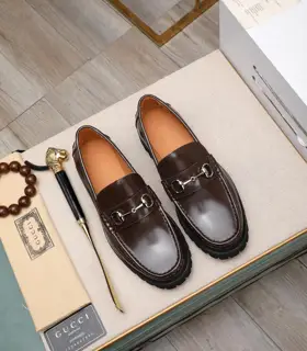 Gucci metal buckle loafers