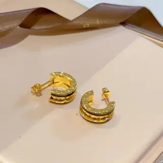 Bvlgari B.zero 1rock series rivet earrings with ceramic edges for couples. Both men and