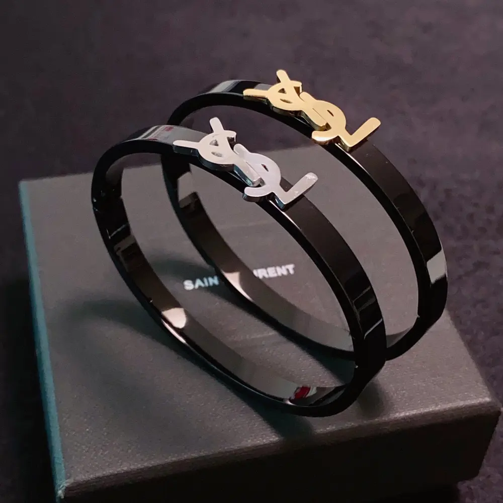 Yves Saint Laurent narrow bracelet with engraved letters