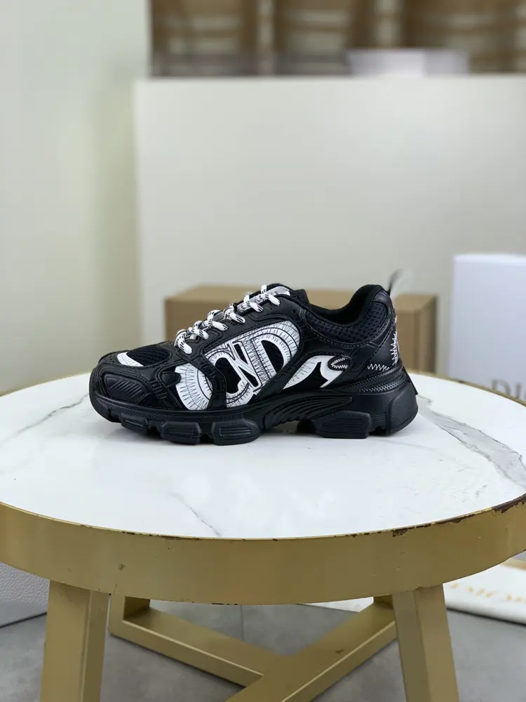 Dior CHRONO shoes have a lot of silver shiny structures with gray mesh materials. The soles