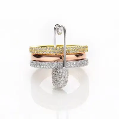 APM Monaco white diamond tricolor pin ring
