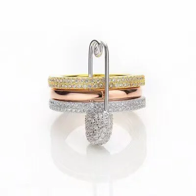APM Monaco white diamond tricolor pin ring